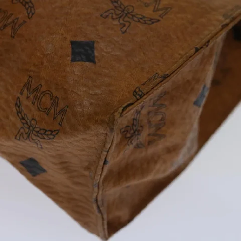 MCM Pre-owned Leather clutches Brown Dames