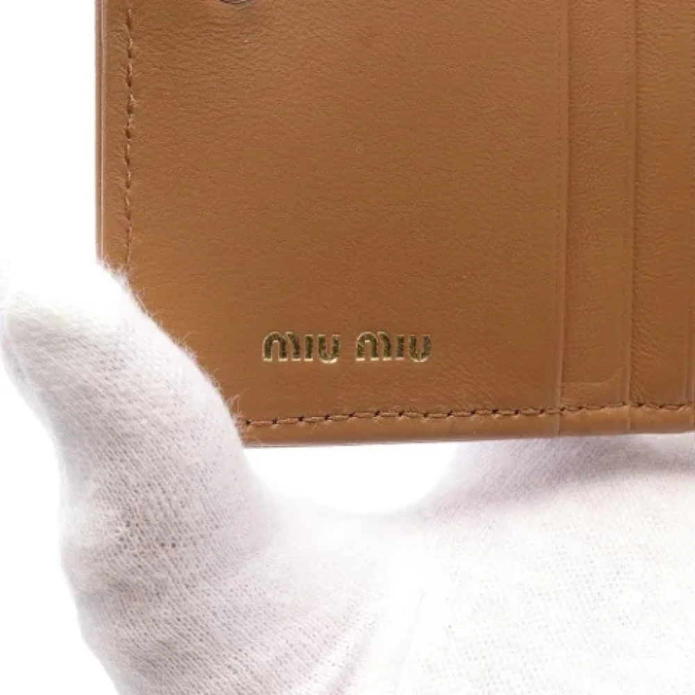 Miu Pre-owned Leather wallets Brown Dames