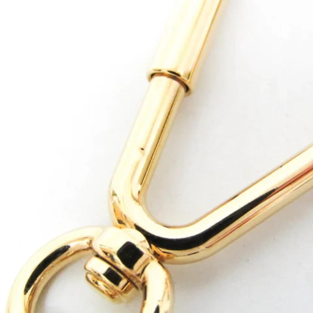 Louis Vuitton Vintage Pre-owned Metal key-holders Yellow Dames