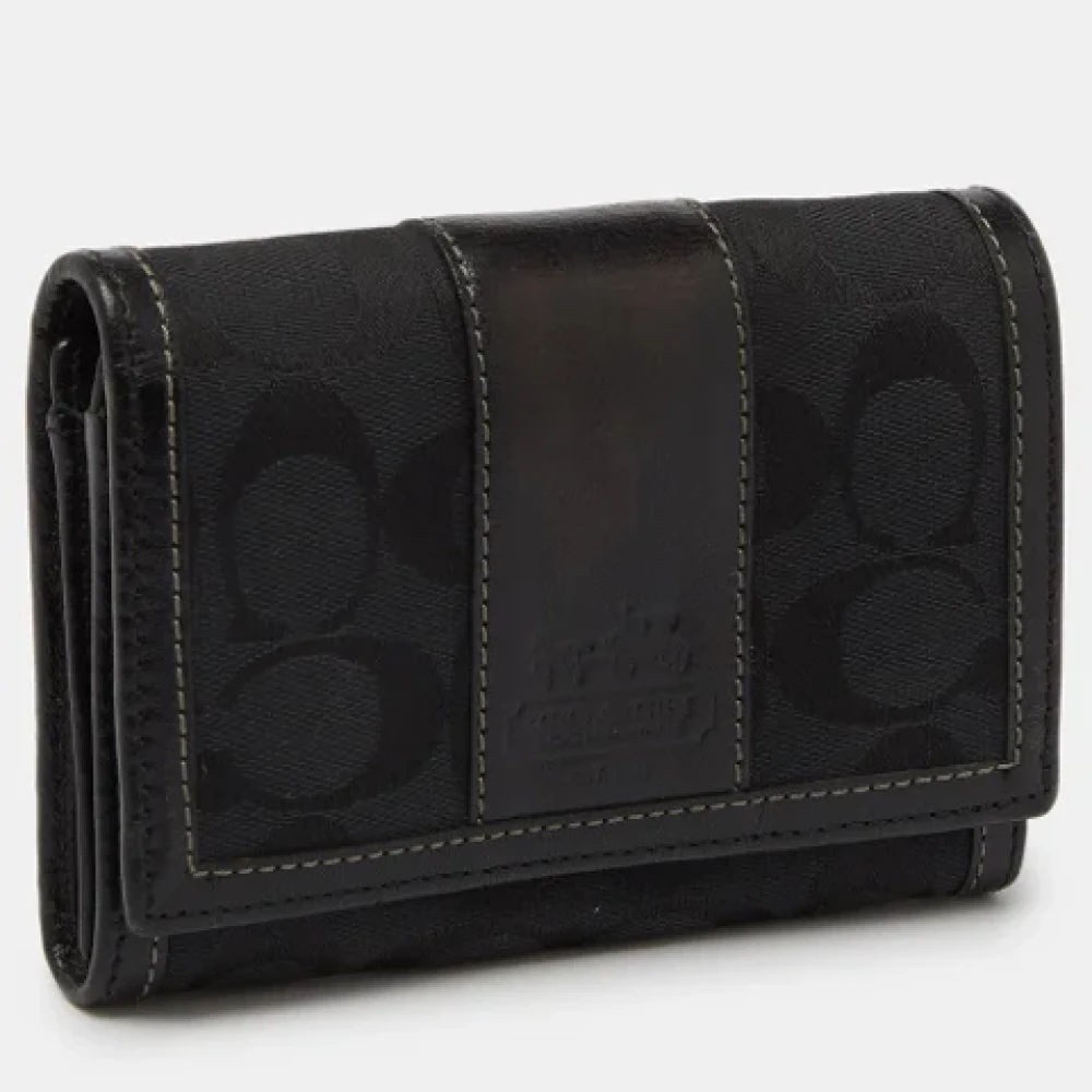 Coach Pre-owned Canvas wallets Black Dames