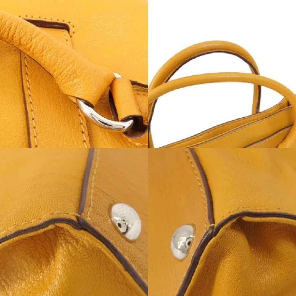 Michael Kors Pre-owned Fabric handbags Yellow Dames