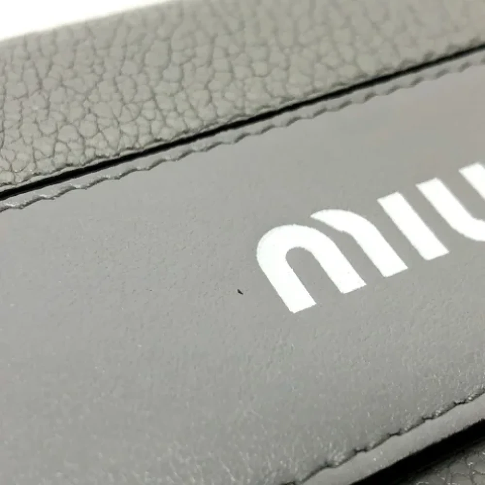 Miu Pre-owned Leather wallets Gray Dames