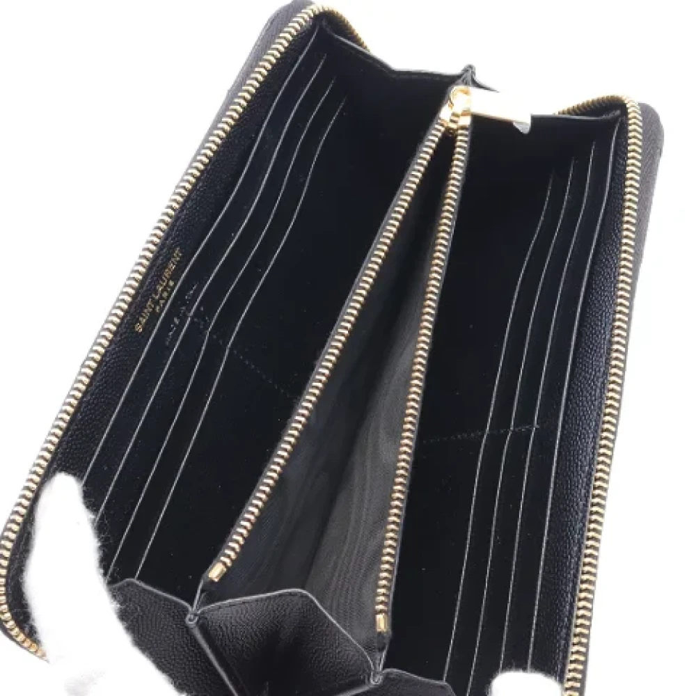 Yves Saint Laurent Vintage Pre-owned Leather wallets Black Dames