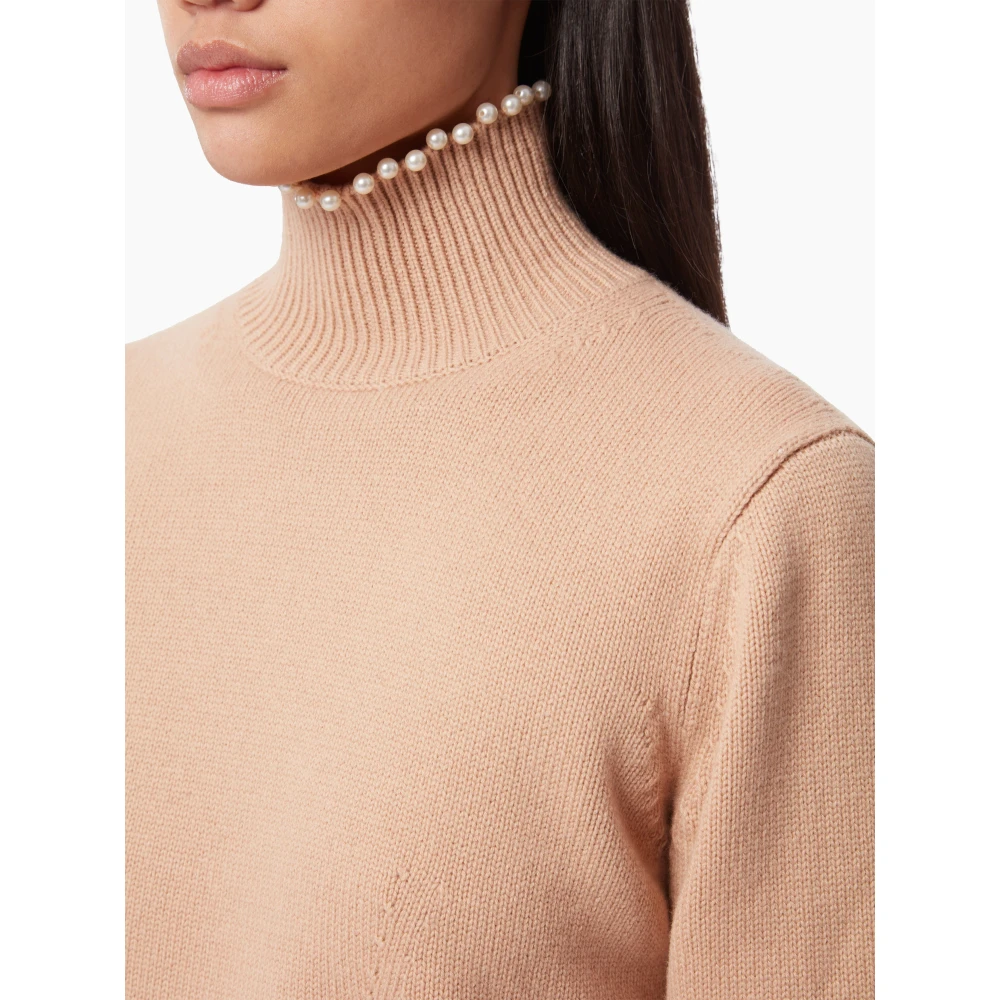 Nina Ricci Gebreide coltrui in beige Dames