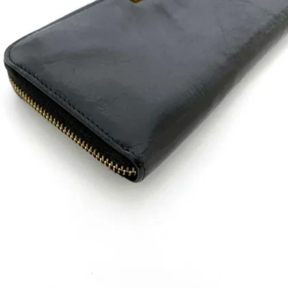 Miu Pre-owned Leather wallets Black Dames