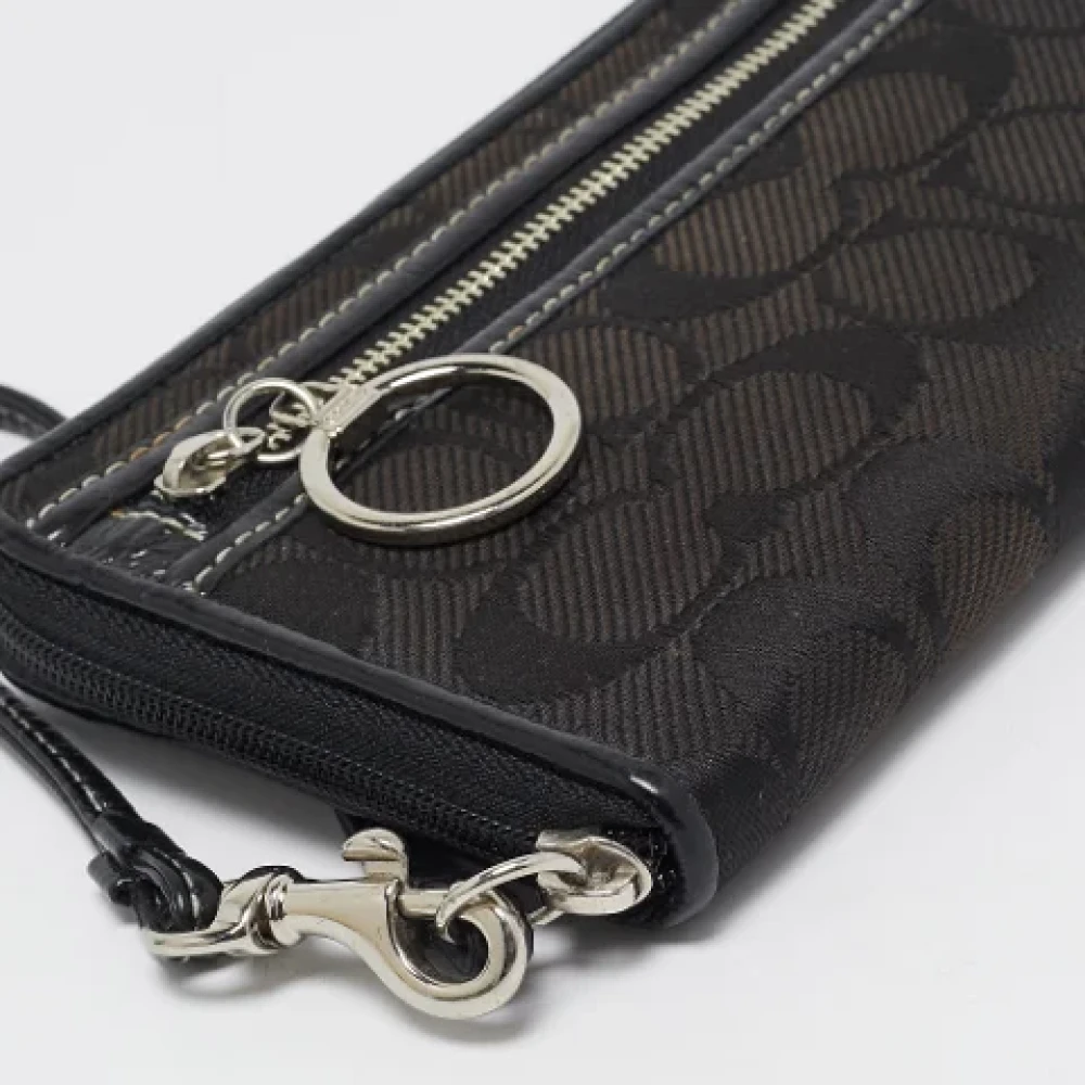 Coach Pre-owned Canvas clutches Black Dames