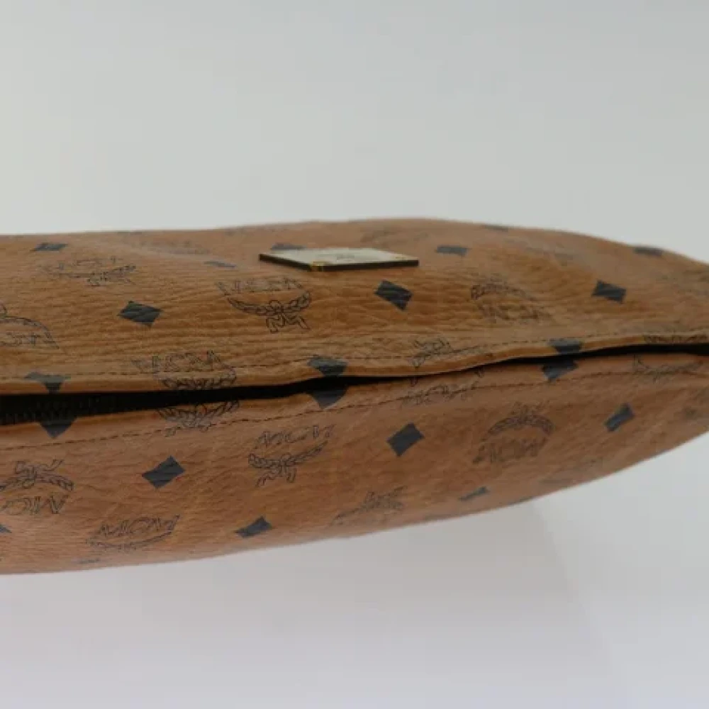 MCM Pre-owned Leather clutches Brown Dames