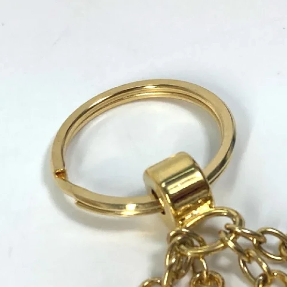 Dior Vintage Pre-owned Metal key-holders Yellow Dames