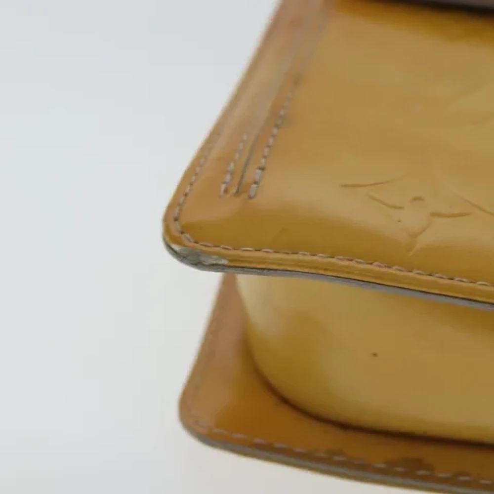Louis Vuitton Vintage Pre-owned Leather pouches Yellow Dames