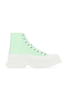 elevate-your-sneaker-game-with-green-leather-tread-slick-sneakers