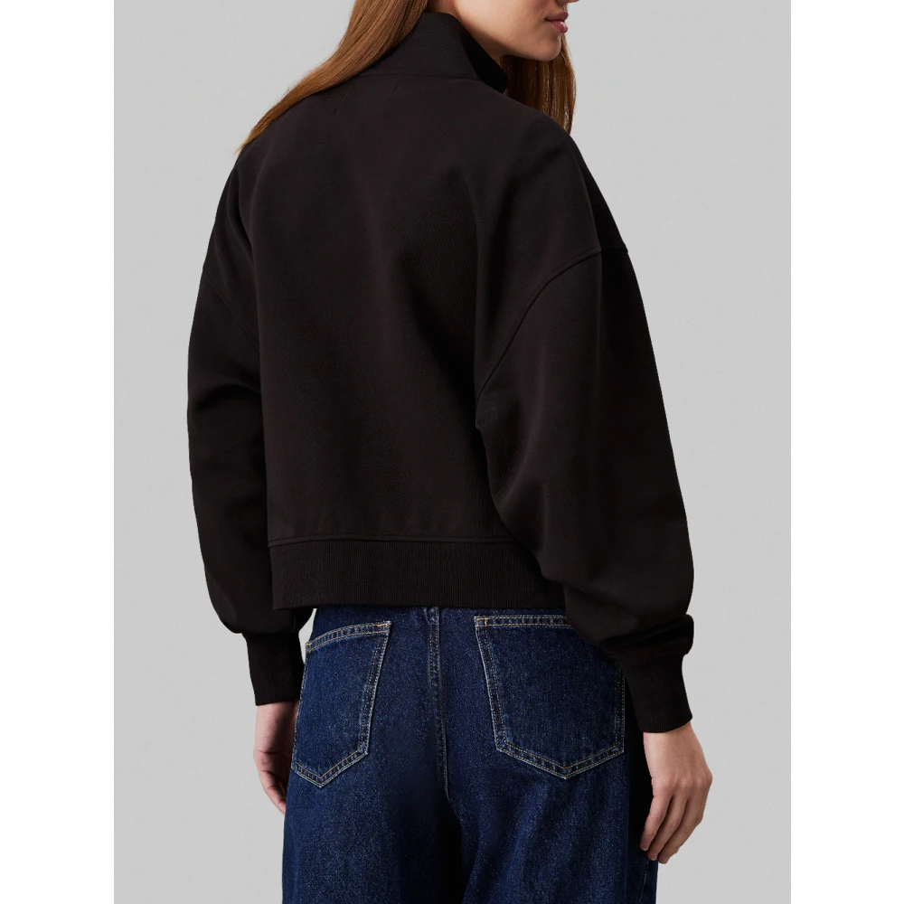 Calvin Klein Jeans Zwarte trui met satijnen logo applicatie Black Dames