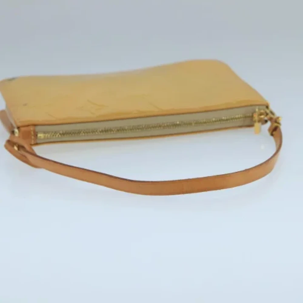 Louis Vuitton Vintage Pre-owned Leather pouches Beige Dames