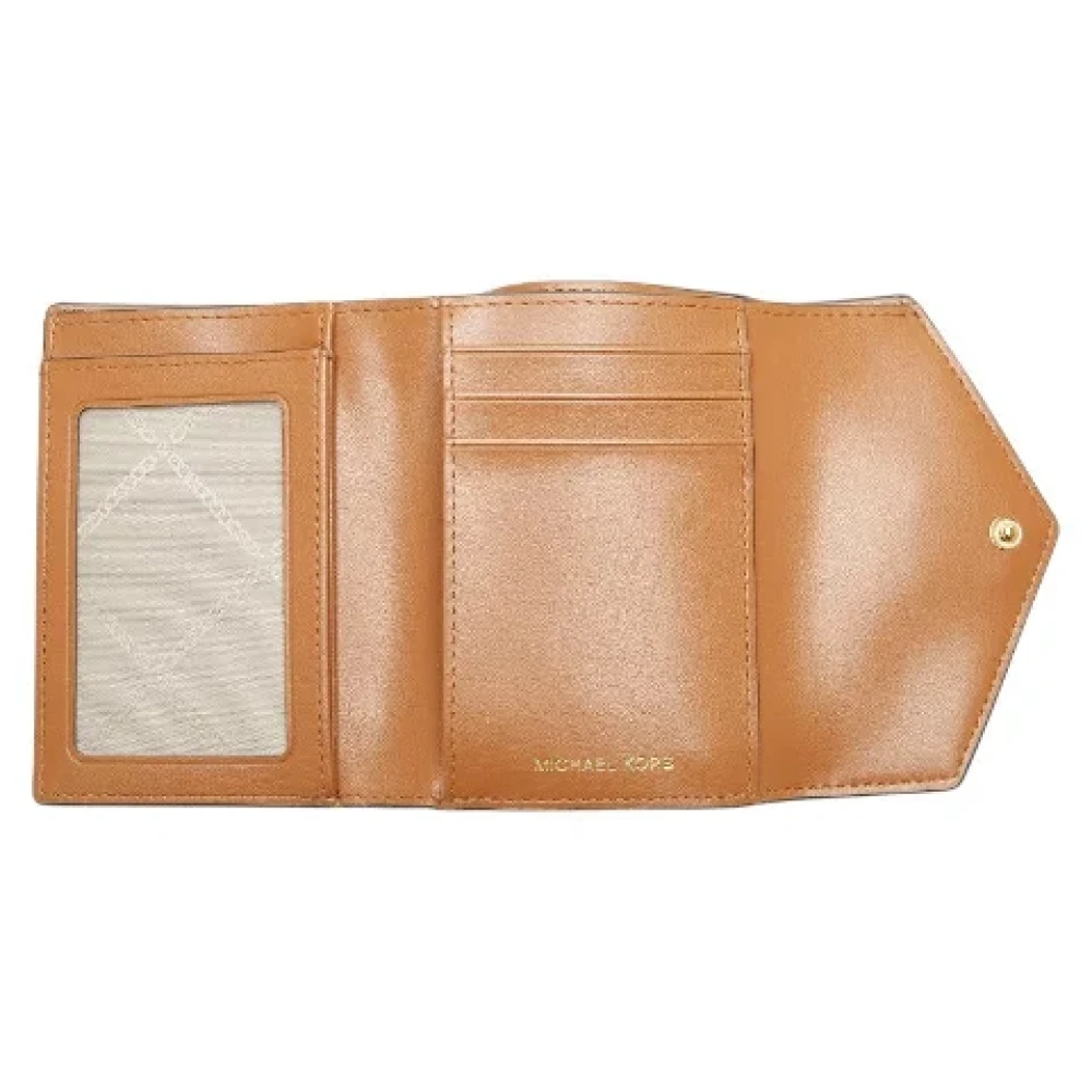 Michael Kors Pre-owned Canvas wallets Brown Dames