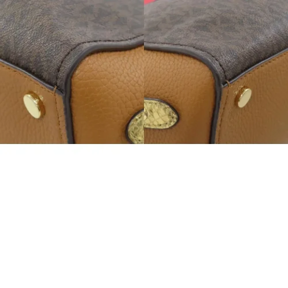 Michael Kors Pre-owned Fabric handbags Brown Dames