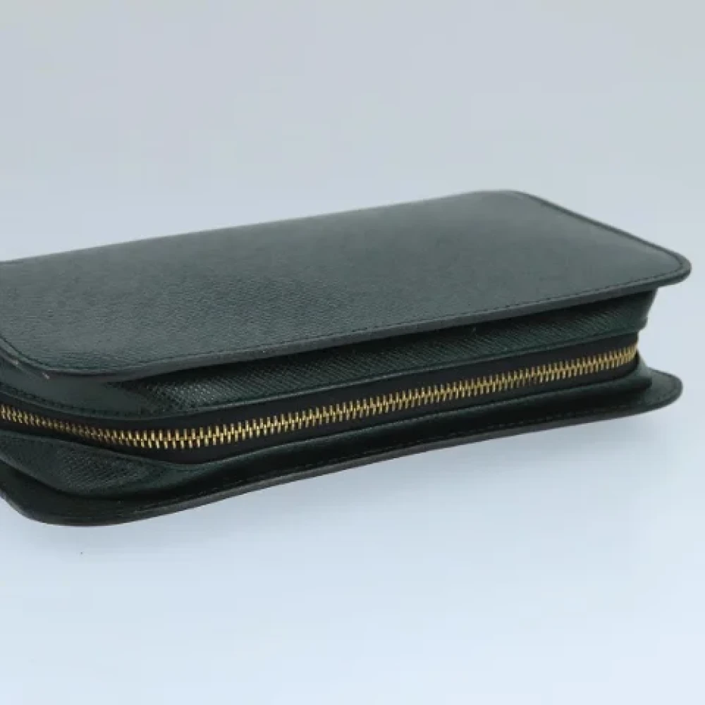 Louis Vuitton Vintage Pre-owned Leather clutches Green Dames