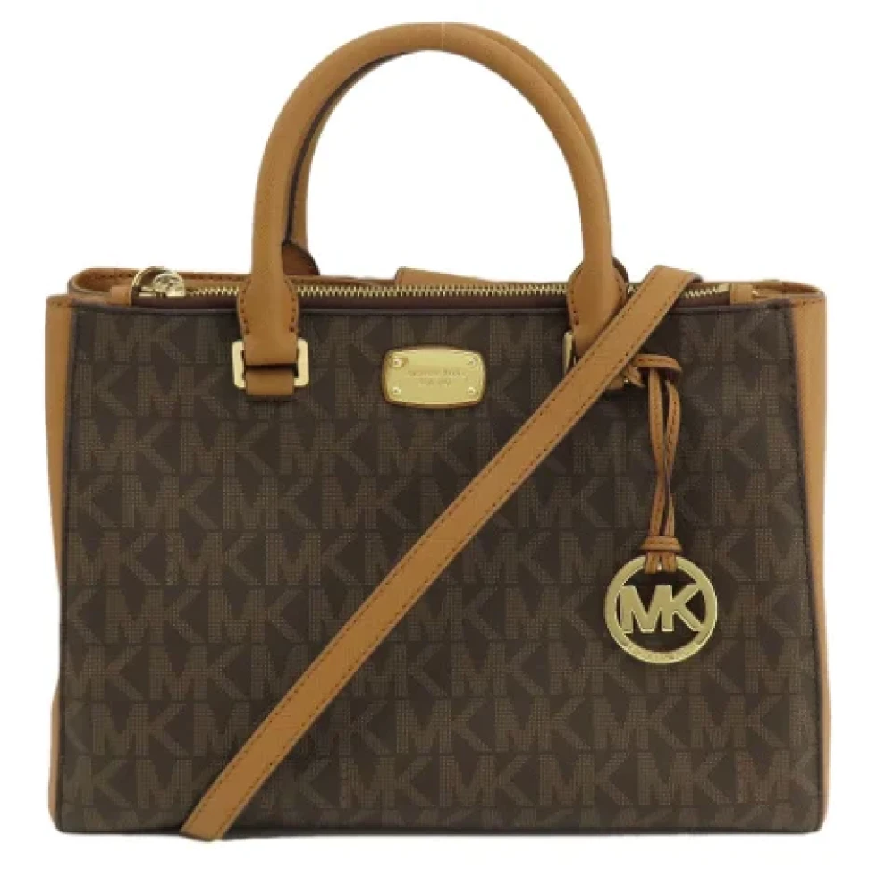 Michael Kors Pre-owned Plastic totes Brown Dames