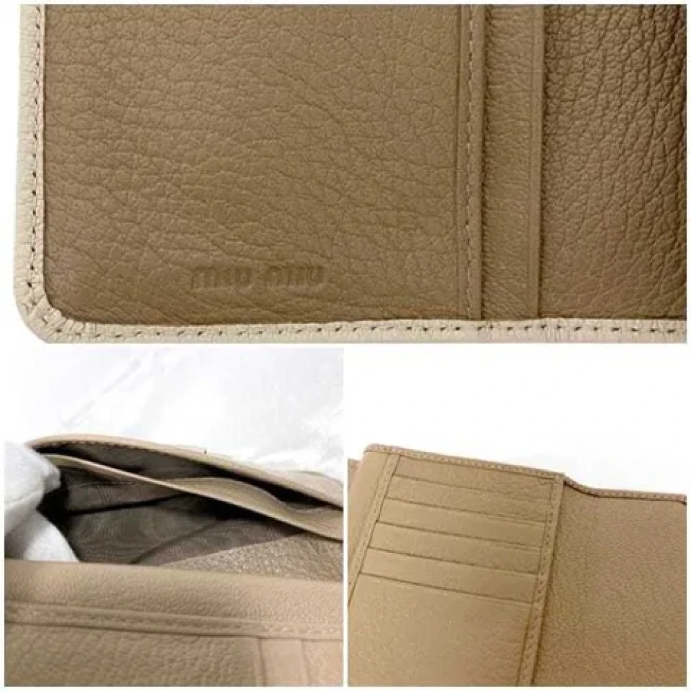 Miu Pre-owned Leather wallets Beige Dames
