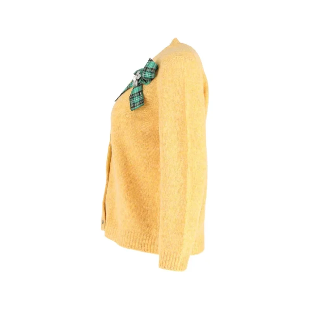 Miu Pre-owned Wool tops Yellow Dames