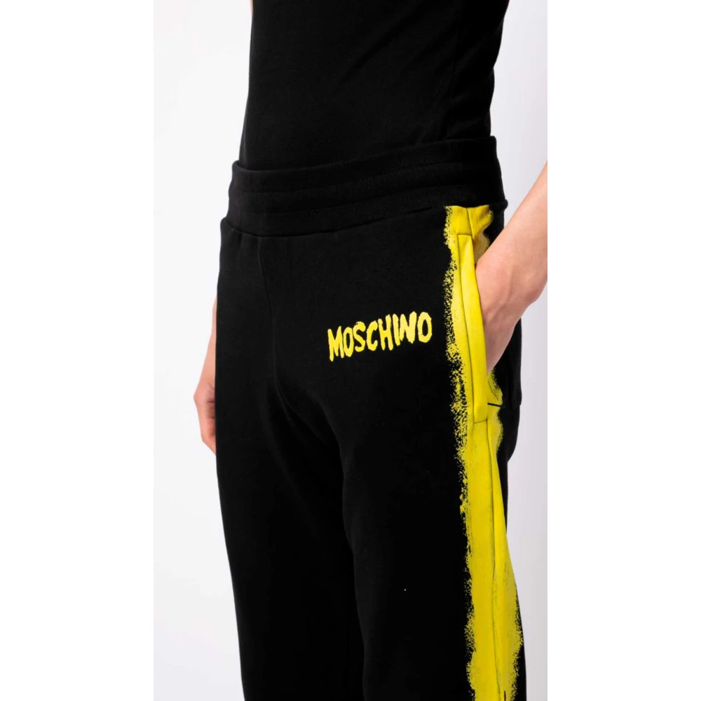 Moschino Zwarte sweatpants met gele verfeffect Black Heren