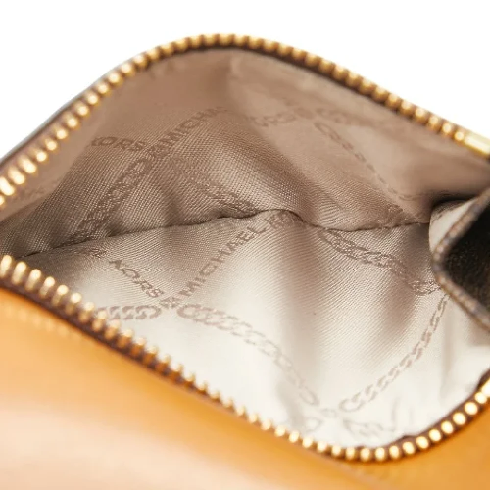 Michael Kors Pre-owned Canvas wallets Brown Dames