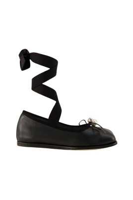 black-leather-heart-toe-ballerinas