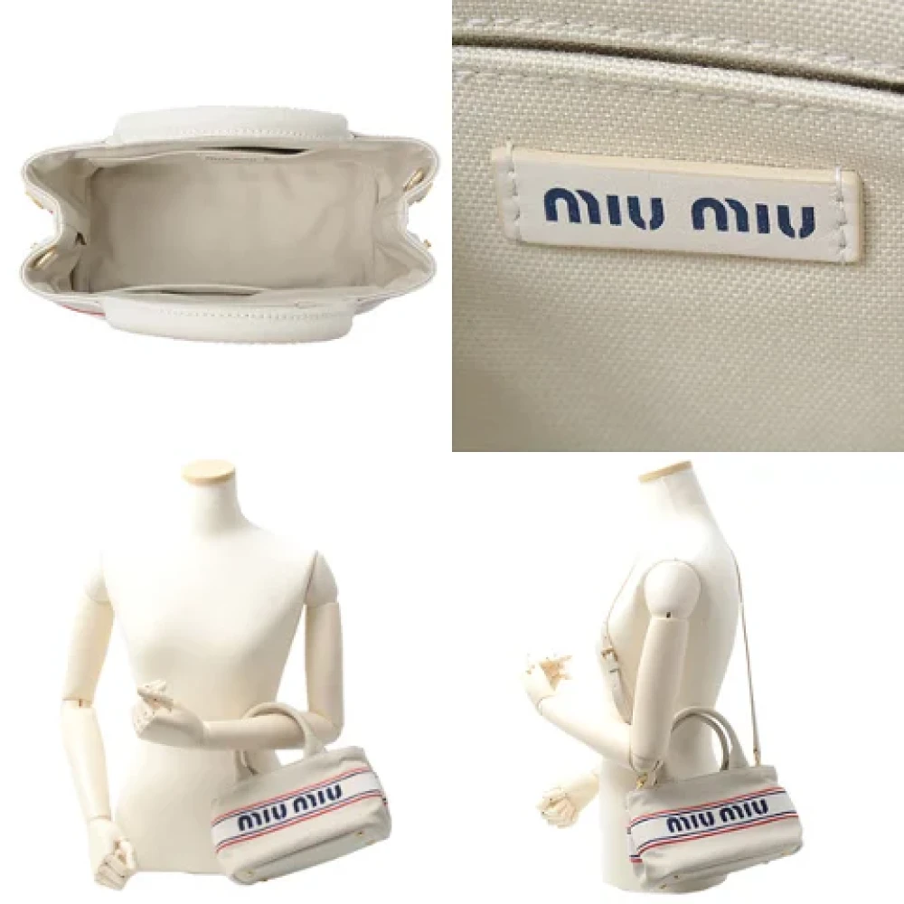Miu Pre-owned Canvas handbags White Dames