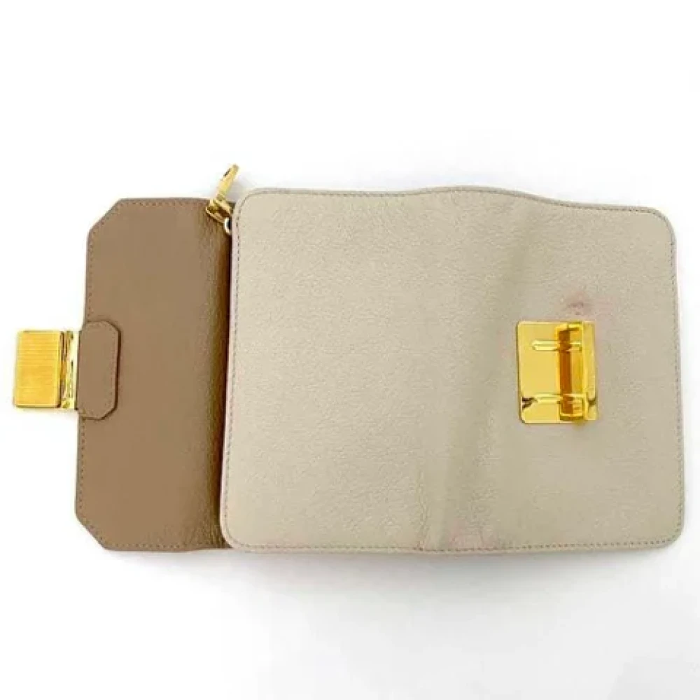Miu Pre-owned Leather wallets Beige Dames