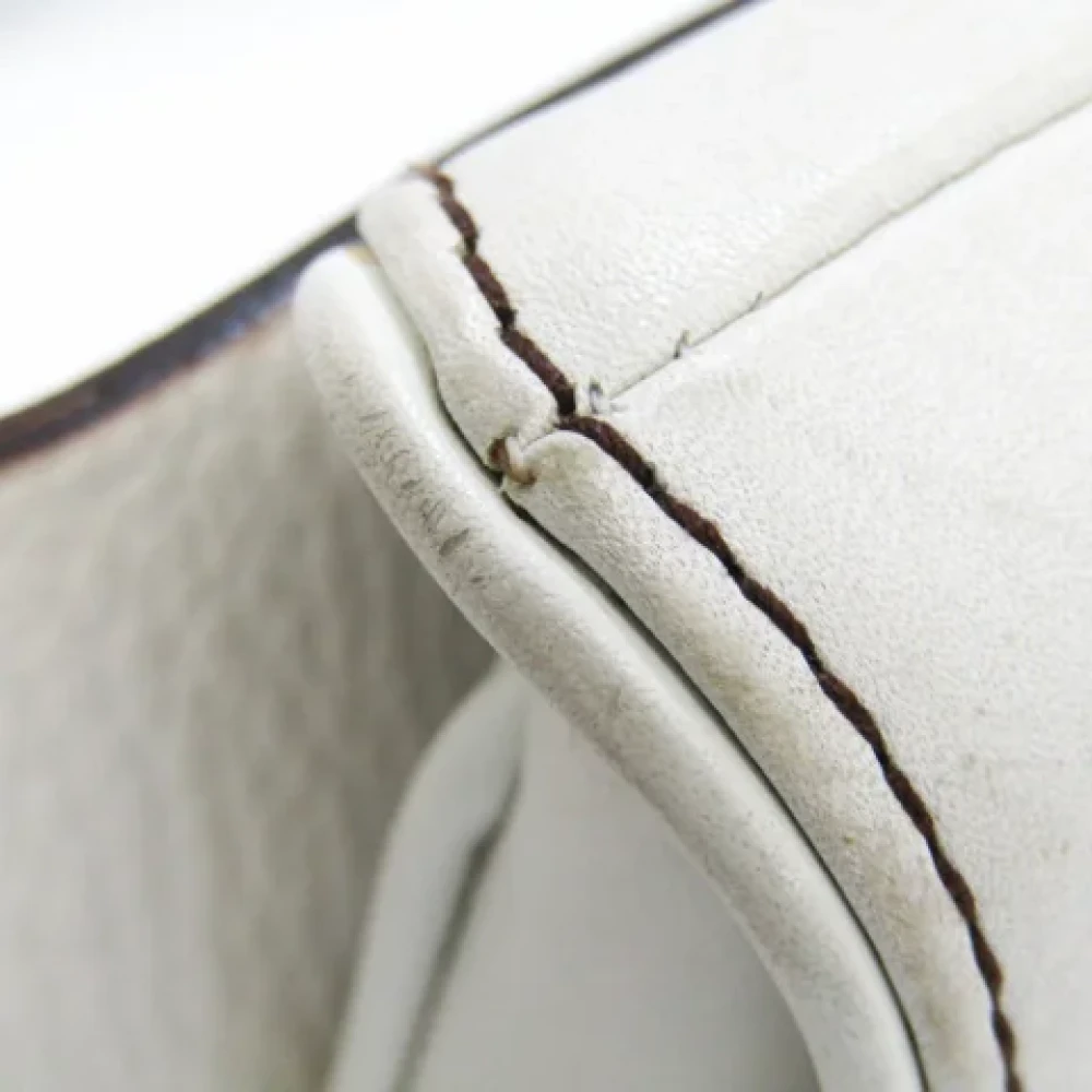 Dior Vintage Pre-owned Leather clutches White Dames