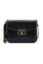 black-leather-crossbody-bag-with-magnetic-button