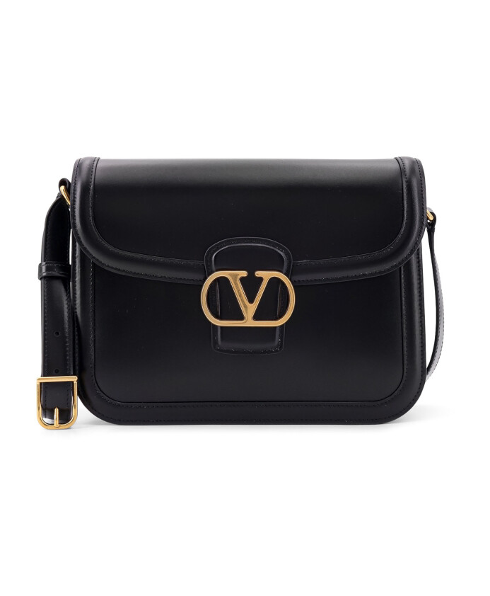 black-leather-crossbody-bag-with-magnetic-button