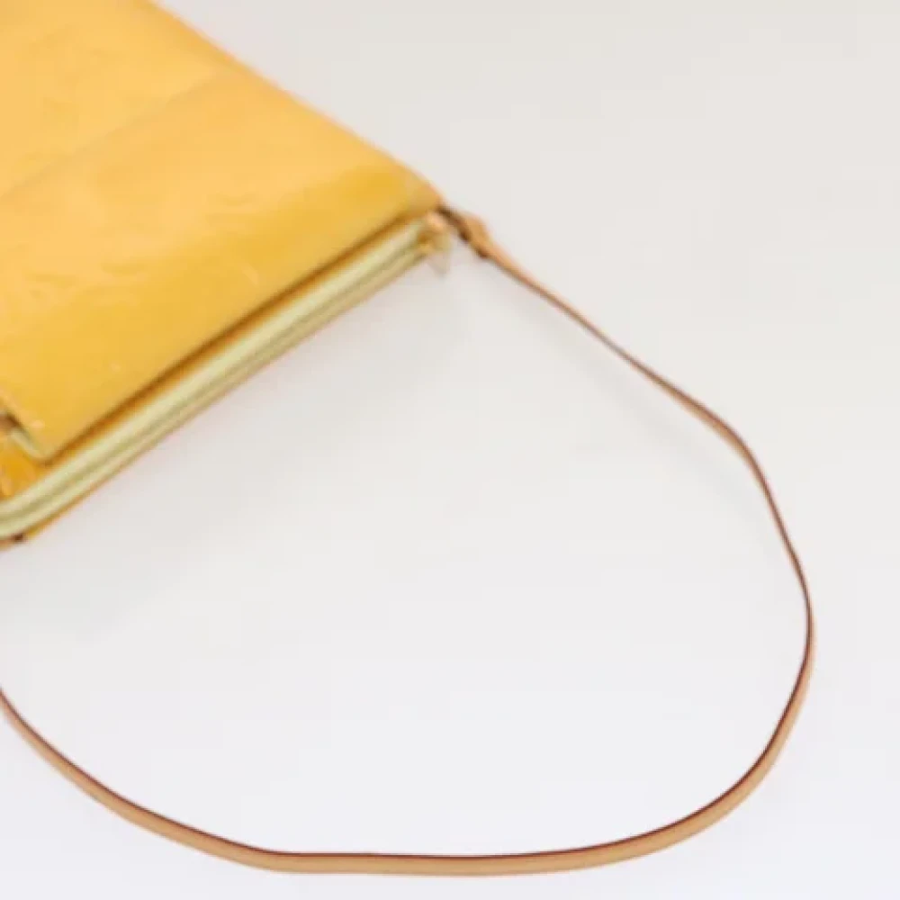 Louis Vuitton Vintage Pre-owned Leather clutches Yellow Dames