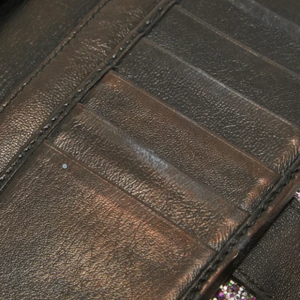 Alexander McQueen Pre-owned Leather wallets Gray Dames
