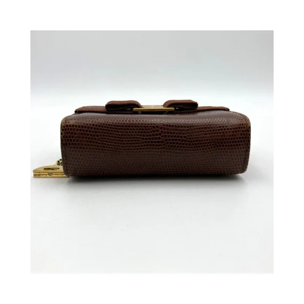 Salvatore Ferragamo Pre-owned Leather pouches Brown Dames