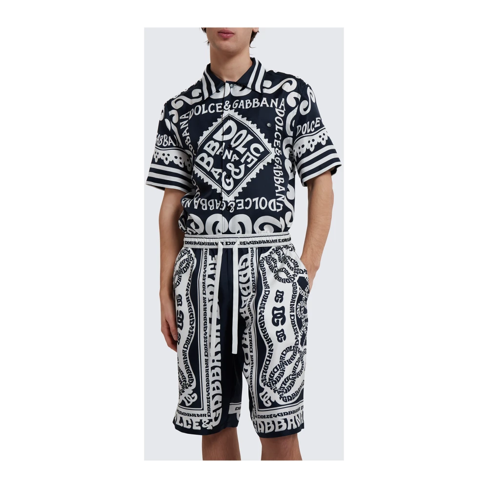 Dolce & Gabbana Marina Bedrukte Zijden Bermuda Shorts Blue Heren