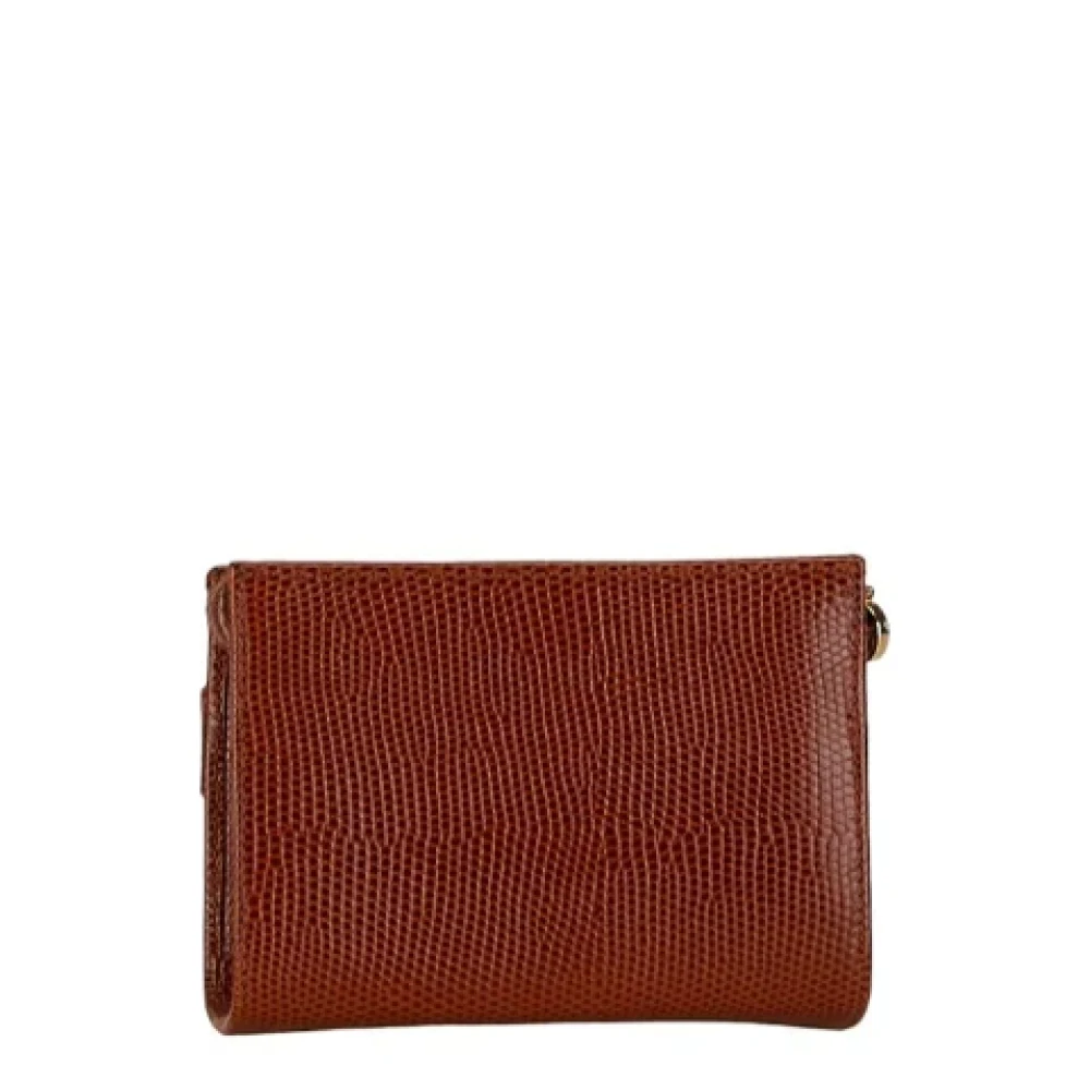 Salvatore Ferragamo Pre-owned Leather clutches Brown Dames