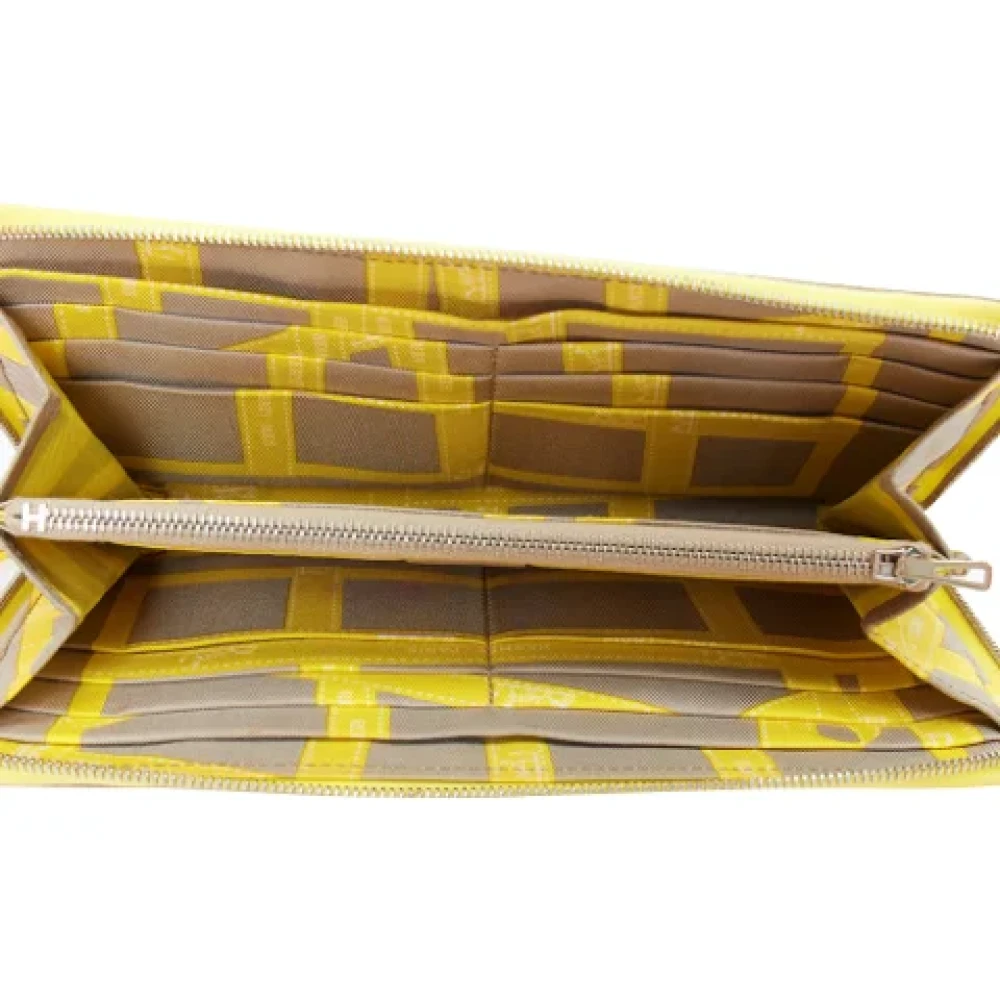 Hermès Vintage Pre-owned Leather wallets Yellow Dames
