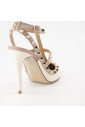 rockstud-pointed-toe-caged-pumps