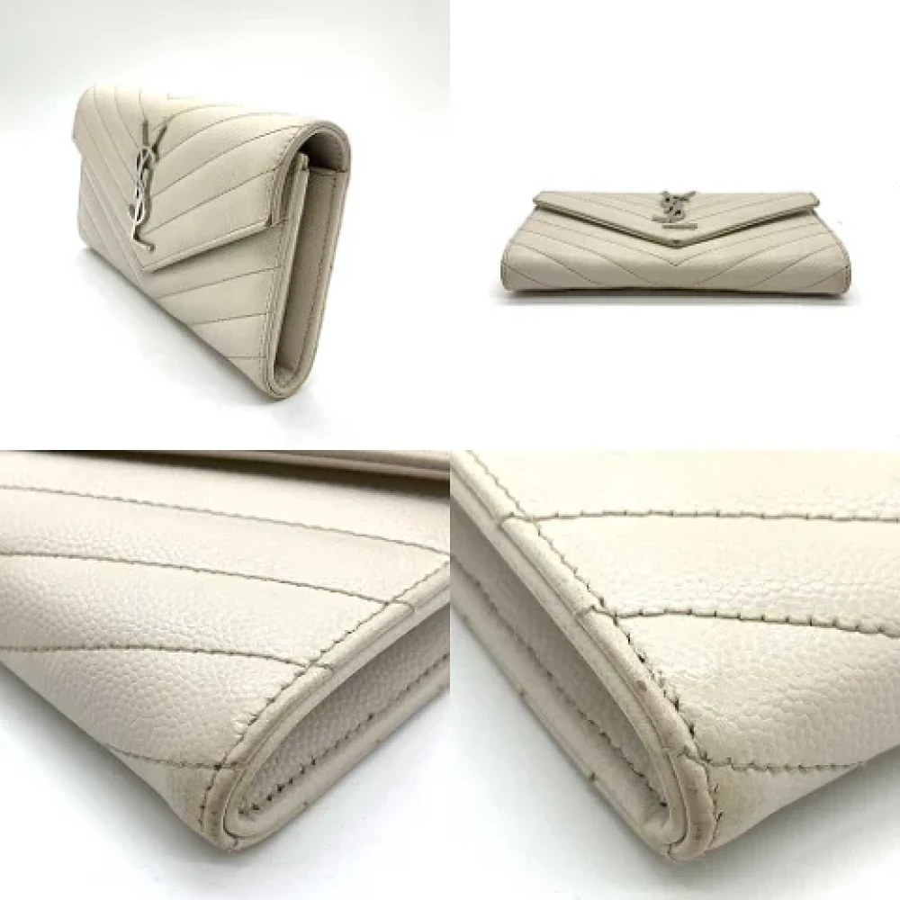 Yves Saint Laurent Vintage Pre-owned Leather wallets Beige Dames