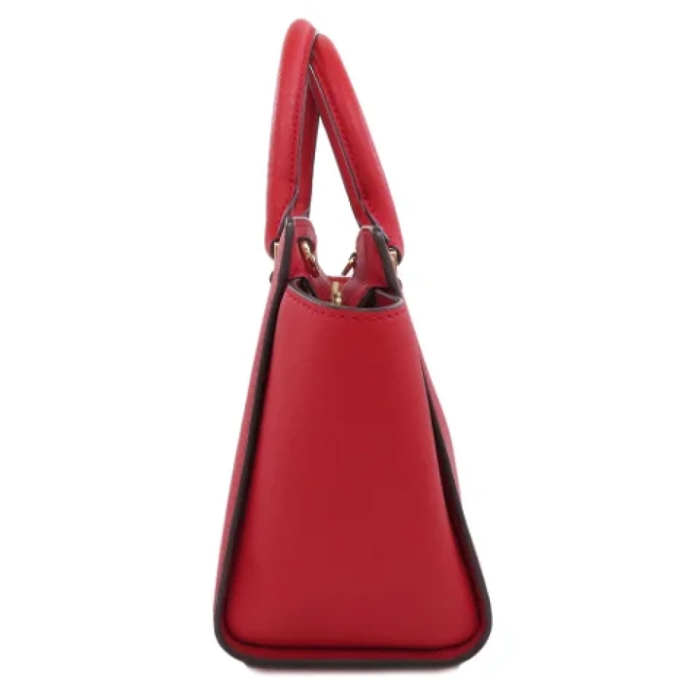 Michael Kors Pre-owned Fabric handbags Red Dames