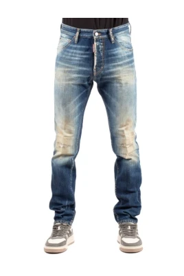Bleknade slitna jeans