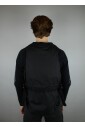 gilet-utilitaire-noir-fonctionnel-et-elegant