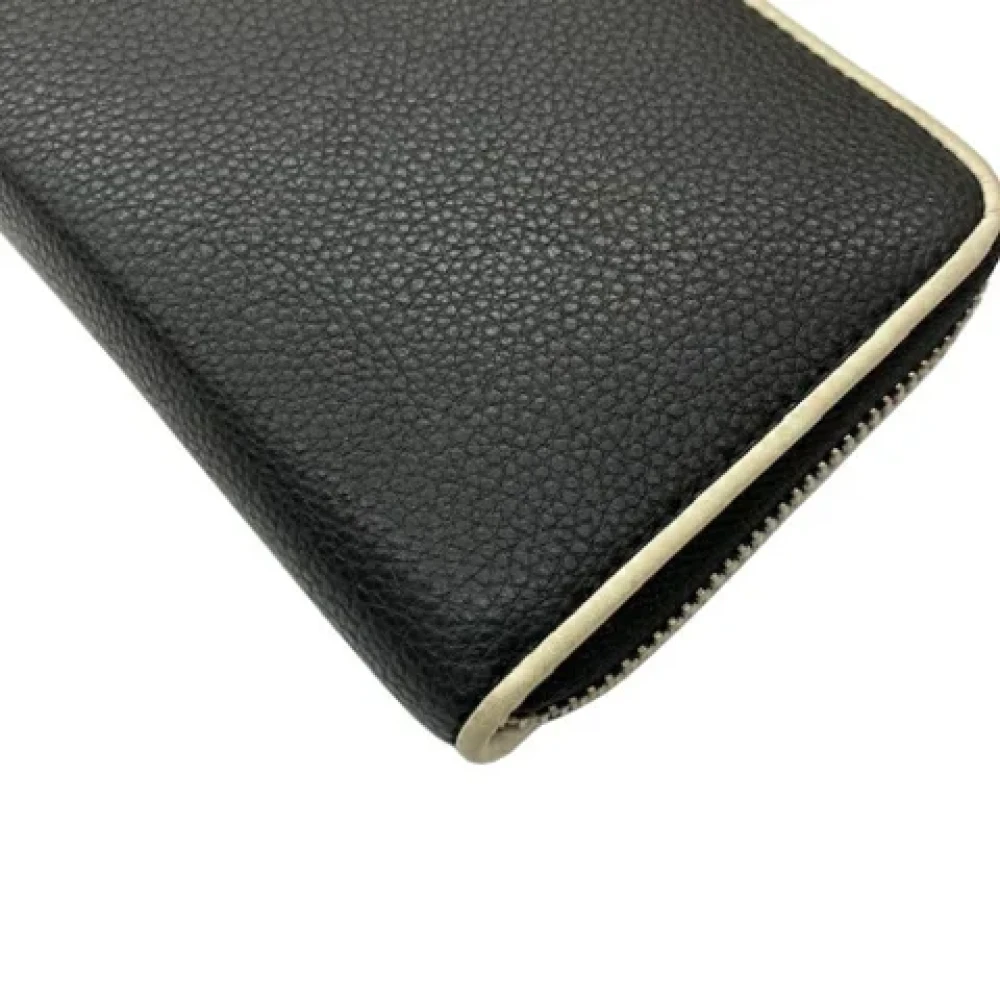 Coach Pre-owned Leather wallets Black Dames
