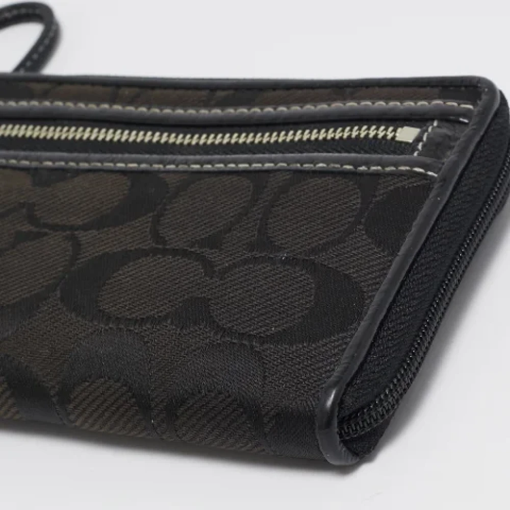 Coach Pre-owned Canvas clutches Black Dames