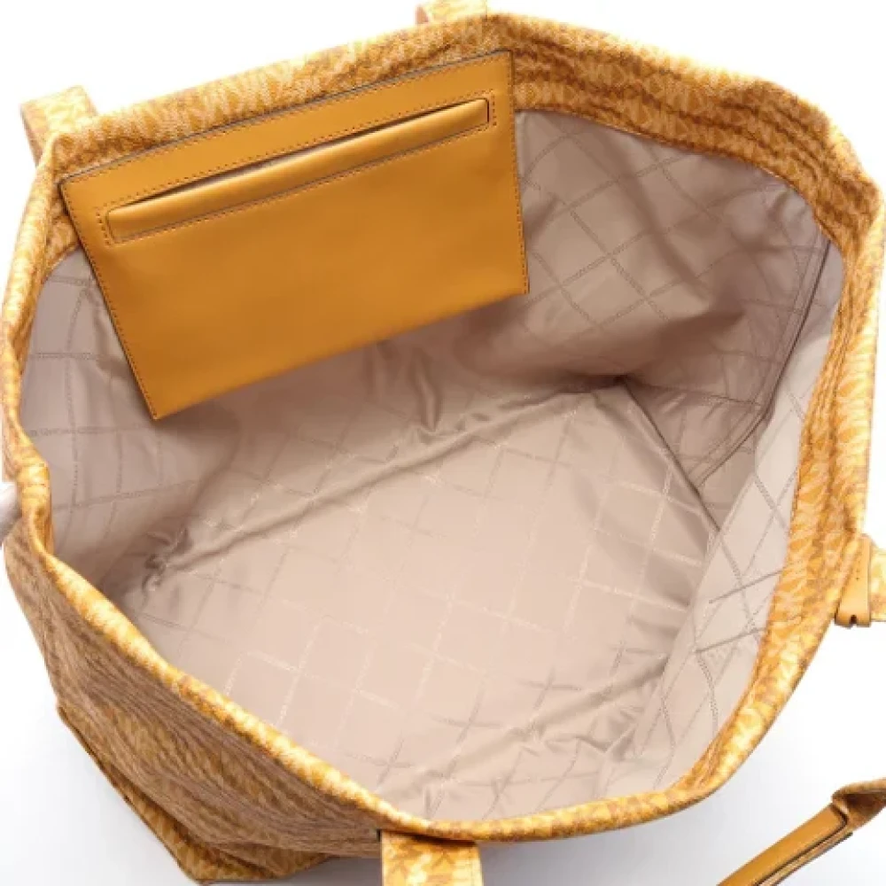 Michael Kors Pre-owned Coated canvas handbags Brown Dames