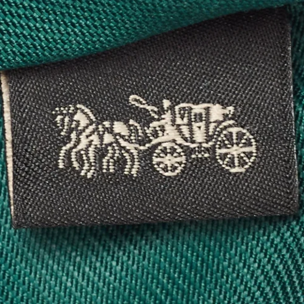 Coach Pre-owned Leather clutches Green Dames
