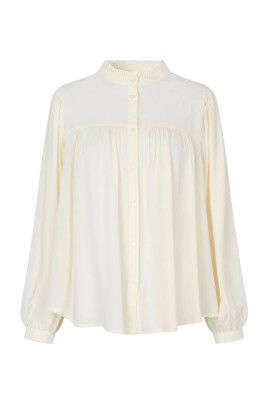 feminin-carall-blus-med-volangdetalj
