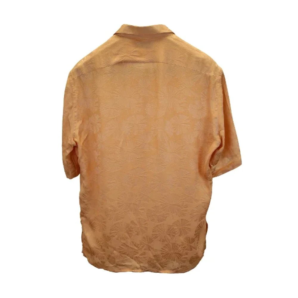 Saint Laurent Vintage Pre-owned Silk tops Orange Dames