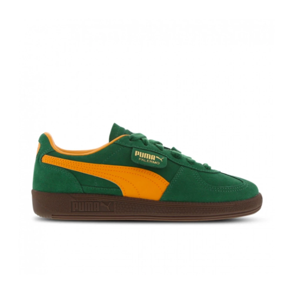 Green and yellow store pumas