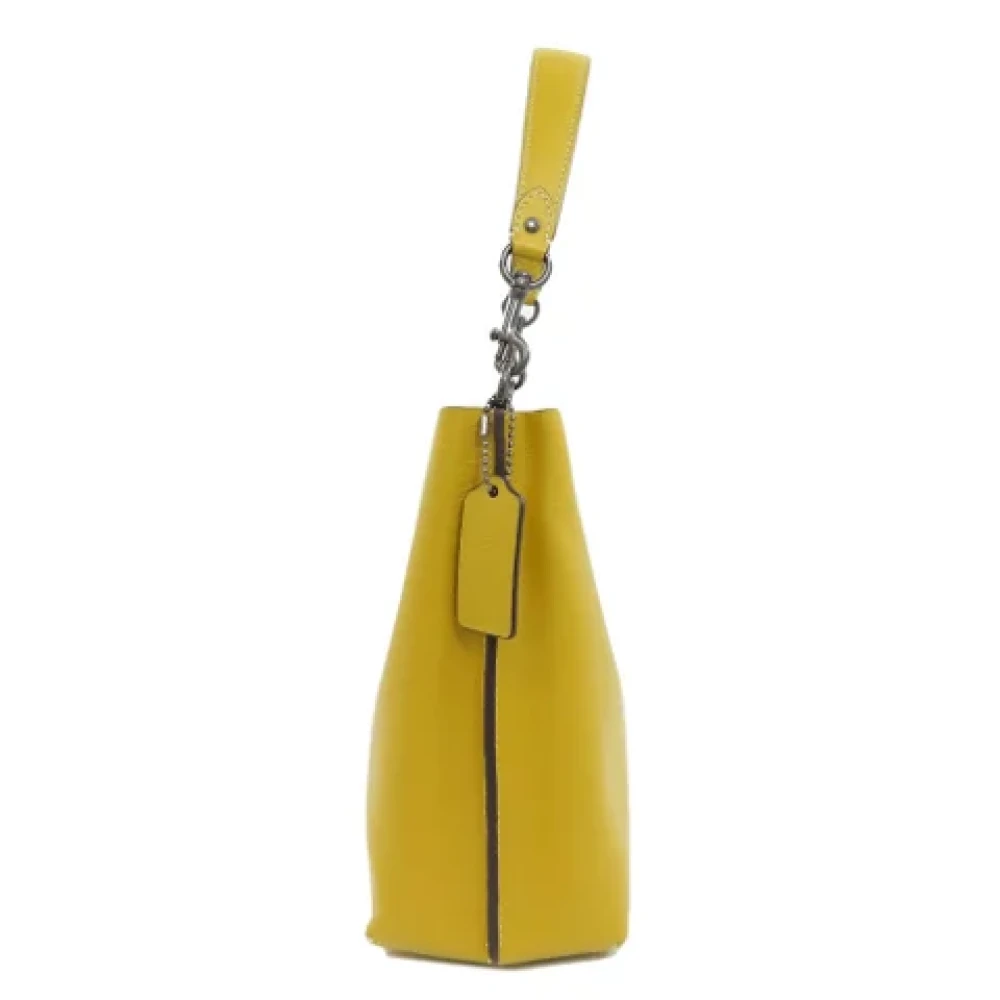 Coach Pre-owned Leather handbags Yellow Dames