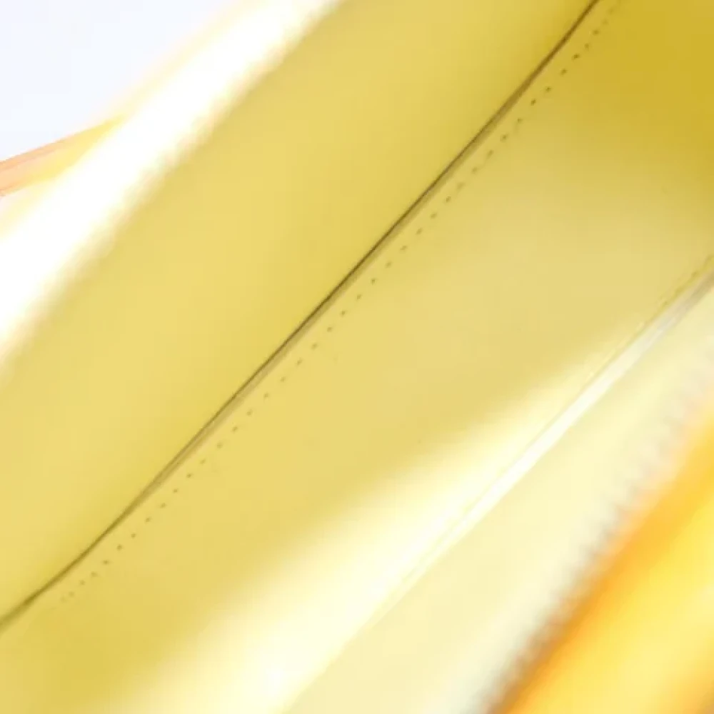 Louis Vuitton Vintage Pre-owned Leather clutches Yellow Dames
